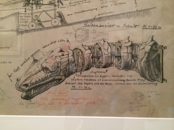 Kettelhut called out the length of the neck as well as the tension springs, framework, control cables and hoses required for the creatures fiery breath. He calls out "only rubber!" for the mouth area.
